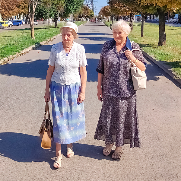 http://Two%20senior%20ladies%20walking%20down%20a%20city%20street