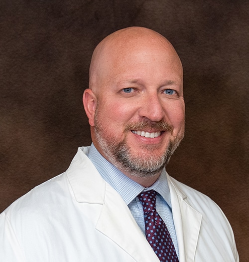 M.  Sims, MD